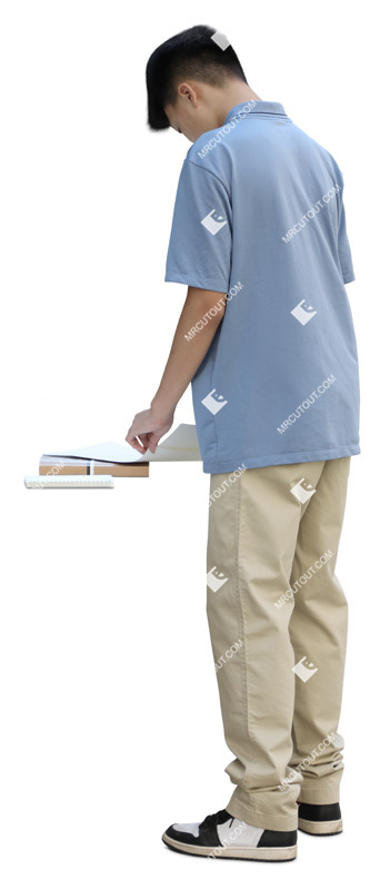 Boy reading a book cut out pictures (20168)