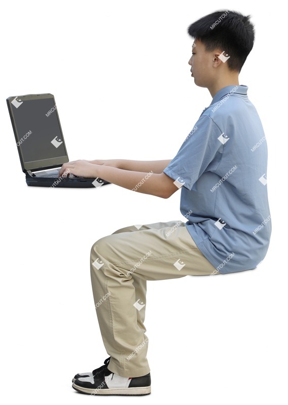 Boy with a computer writing people cutouts (17584)