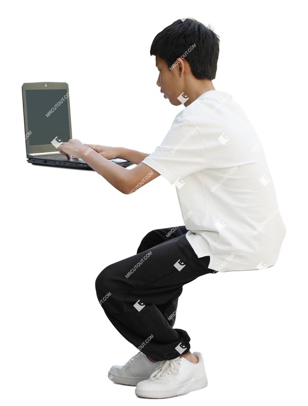 Boy with a computer writing cut out pictures (17879)
