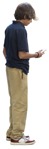 Boy with a smartphone standing  (12035) - miniature