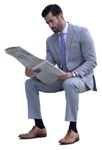 Businessman reading a newspaper photoshop people (14596) - miniature