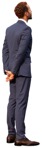 A man in a grey suit standing and looking at something - human png - miniature