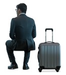 Businessman with a baggage sitting  (19003) - miniature