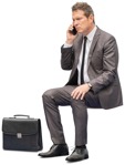 Businessman with a smartphone sitting png people (12245) - miniature