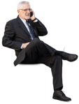 Businessman with a smartphone sitting people cutouts (12284) - miniature