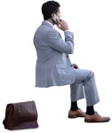 Businessman with a smartphone sitting photoshop people (14594) | MrCutout.com - miniature