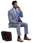 Businessman with a smartphone sitting photoshop people (14597) - miniature