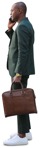 Businessman with a smartphone standing  (8607) - miniature