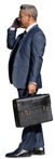 Businessman with a smartphone standing  (13834) - miniature