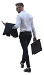 Cut out people - Businessman With A Smartphone Walking 0014 | MrCutout.com - miniature