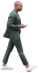 Businessman with a smartphone walking  (8631) - miniature