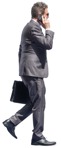 Businessman with a smartphone walking  (14401) - miniature