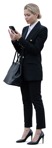 Businesswoman with a smartphone standing  (19454) - miniature