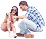 Couple with a smartphone sitting  (3364) - miniature