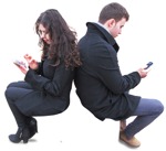 Couple with a smartphone sitting  (2176) - miniature