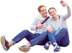 Couple with a smartphone sitting human png (3337) - miniature