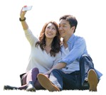 Couple with a smartphone sitting people png (5939) - miniature