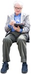 Cut out people - Elderly Reading A Newspaper Writing 0001 | MrCutout.com - miniature