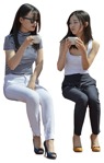 People sitting with a coffee - two young Asian woman human png | MrCutout.com - miniature