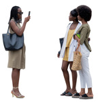 Group of friends with a smartphone standing  (20222) - miniature