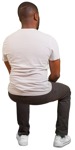 An African man in a T-shirt and black trousers sitting - back view - people png - miniature
