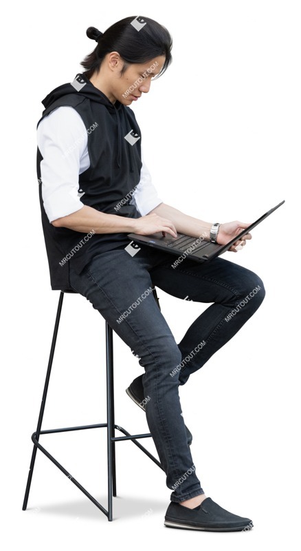 Man with a computer cut out pictures (18033)