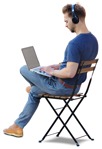 Man with a computer sitting cut out people (9078) - miniature