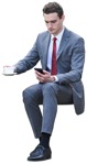 Man with a smartphone drinking coffee  (12114) - miniature