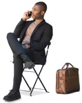 Man with a smartphone sitting people cutouts (12885) | MrCutout.com - miniature