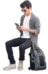 Man with a smartphone sitting person png (14269) - miniature