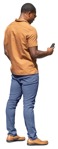 Man with a smartphone standing people png (13501) | MrCutout.com - miniature
