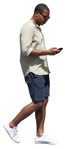 Man with a smartphone walking png people (12943) - miniature