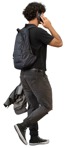 Man with a smartphone walking  (19160) - miniature