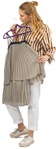 Woman holding a beige dress in a boutique  - people png - miniature