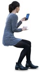 Woman with a smartphone cut out people (10674) - miniature