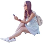 Woman with a smartphone sitting cut out pictures (3382) - miniature